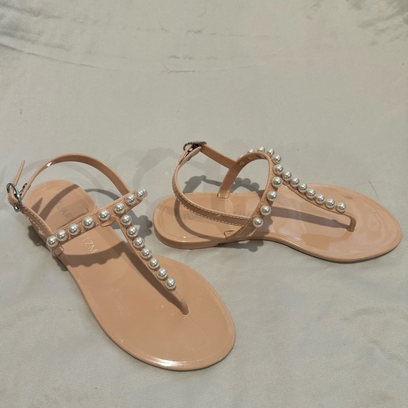 Stuart Weitzman
Goldie Pearly Stud Jelly Sandals, size 7 & size 6, color Poudre - Picture 3 of 8